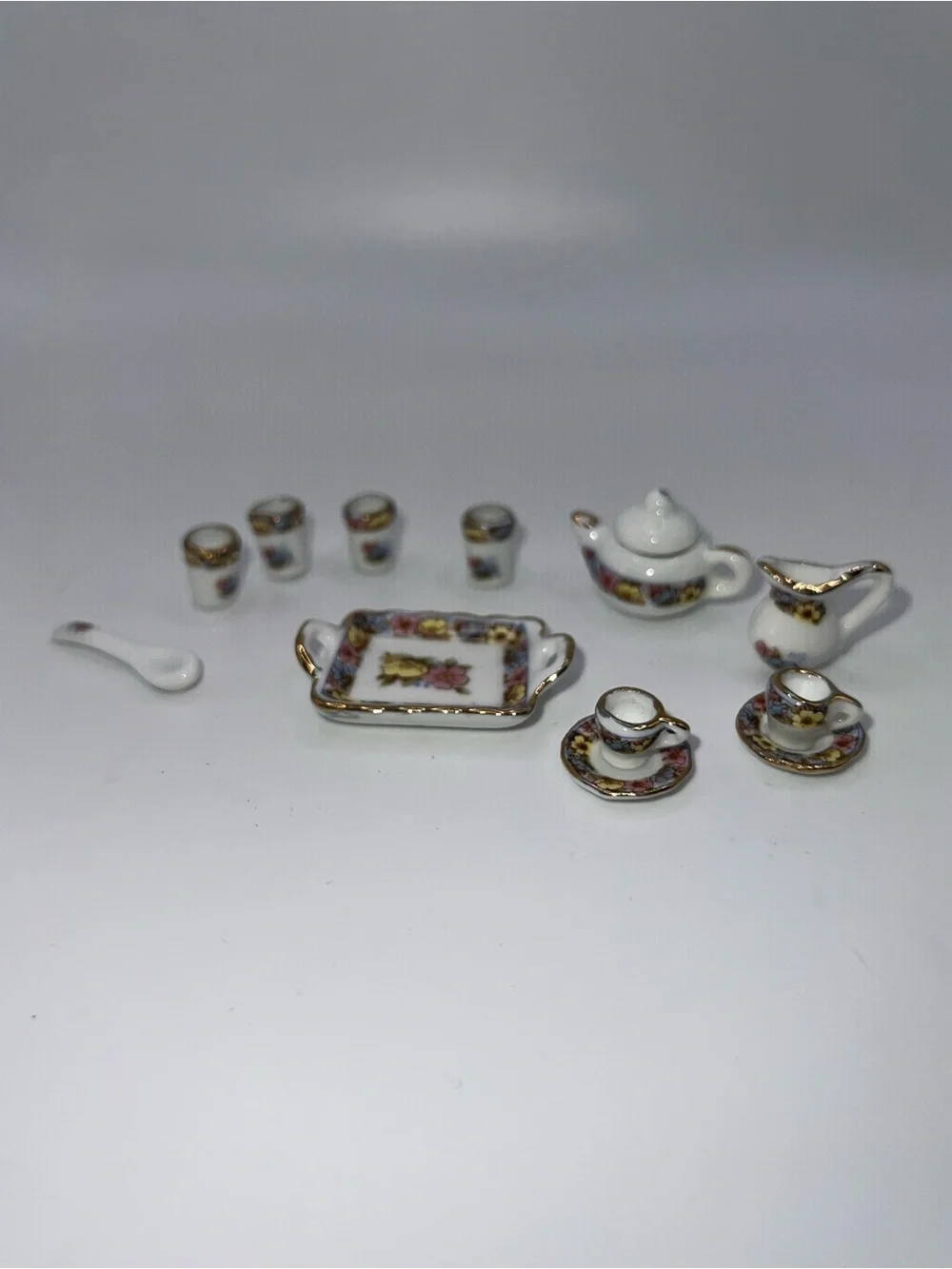 Miniature Porcelain Tea Set with Floral and Gold Trim